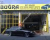 Buğra Oto Tamir Rot Balans Servisi ve hankook lastikleri Yenişehir bayii